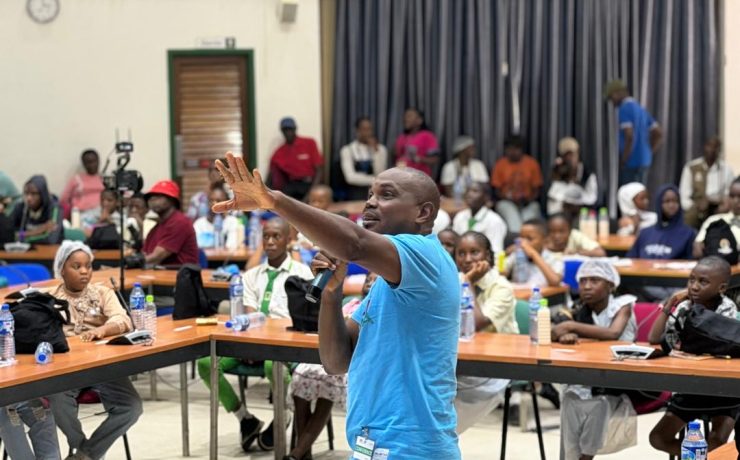 Dr Mark doing a presentation at the IITA Children's Day Celebration | Wild Africa