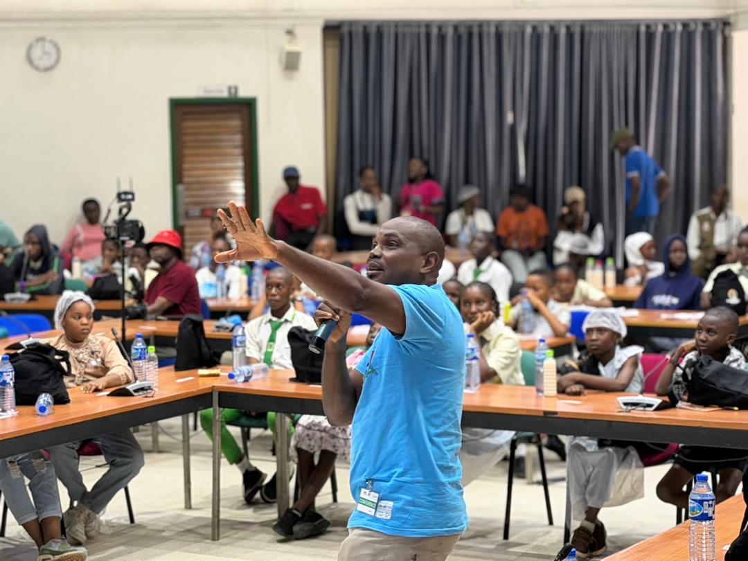 Dr Mark doing a presentation at the IITA Children's Day Celebration | Wild Africa
