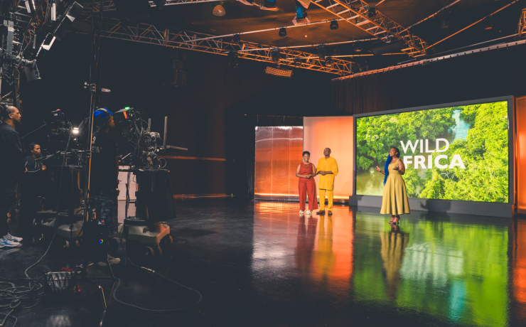The Wild Africa presenters standing in studio.